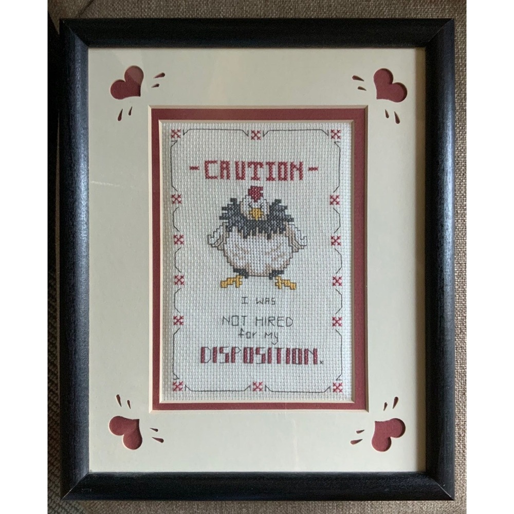 Framed cross stitch - Caution: I Was Not Hired For My Disposition.